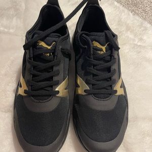 Puma black  / gold women size 6 brand new never wear no box